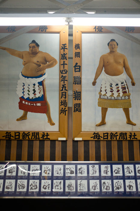 Portraits of yokozunas Musashimaru and Hakuho inside Ryogoku station