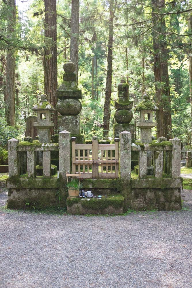 The grave of a feudal lord at Okunoin cemetery Koyasan Japan